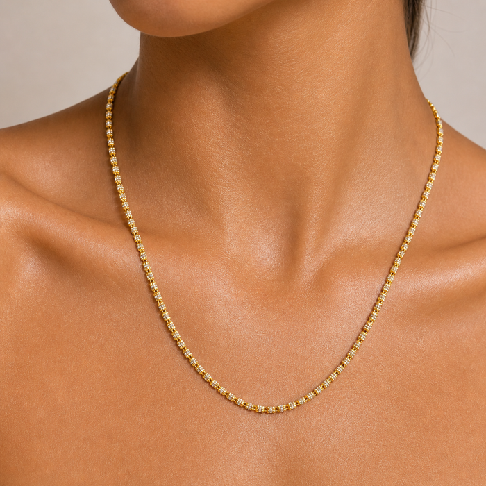 Collier deux tons à billes taillées au diamant, 10K